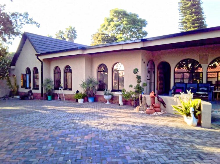 9-Bed Guest House for Sale