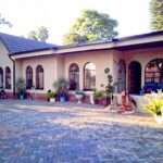 9-Bed Guest House for Sale