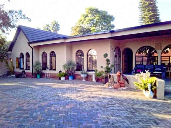 9-Bed Guest House for Sale