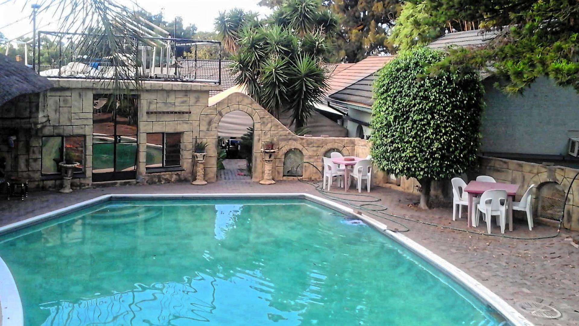 9-Bed Guest House for Sale