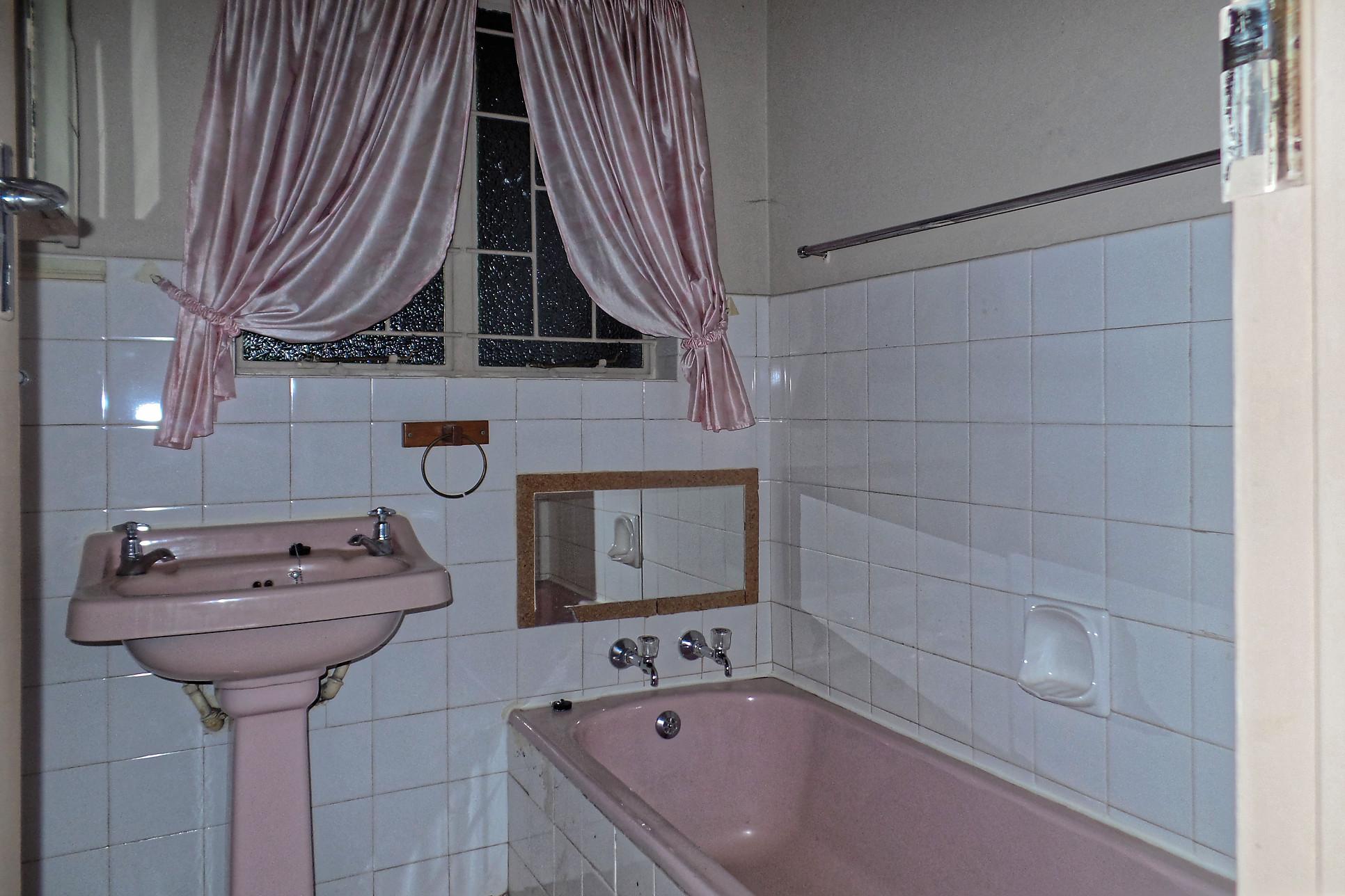 SAM_0378_RP Half tiled bathroom with bath and basin